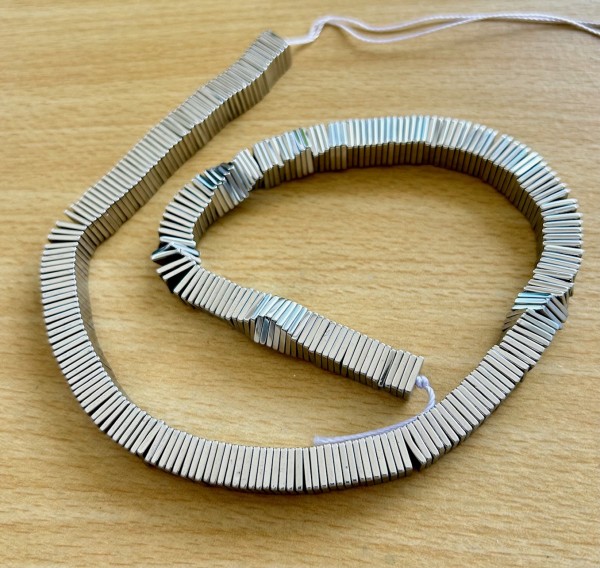 Hematite spacers 8x8x1.4mm - platinum gloss finish - 40cm strand - OFFER approx. 280 spacers